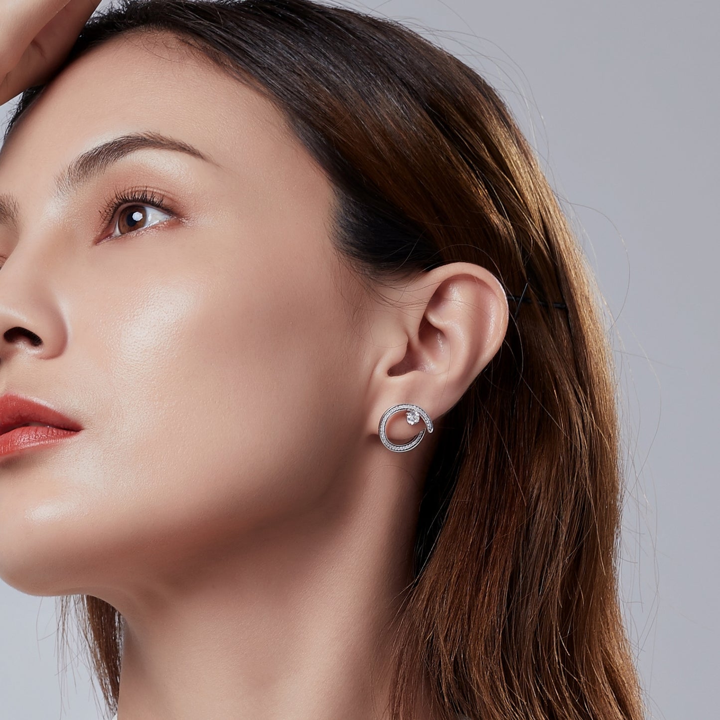 Iridiana Cubic Zirconia Swirl Earrings