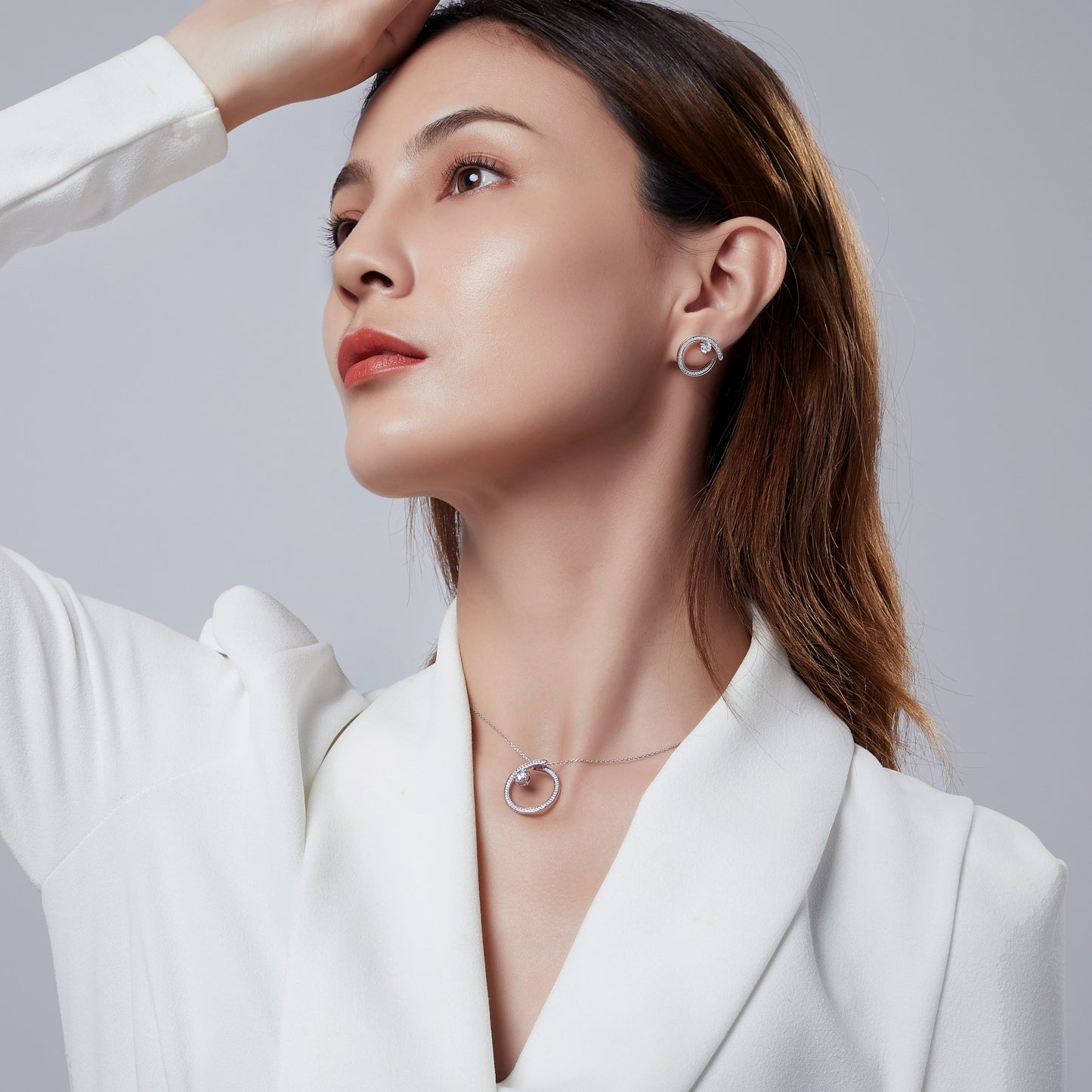 Iridiana Cubic Zirconia Swirl Earrings